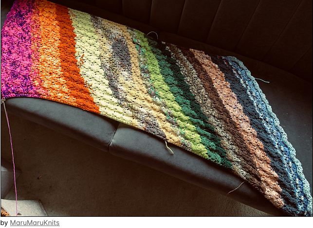 Cassiopeia Mini Skein Shawl knit with mini skeins from yarn scraps