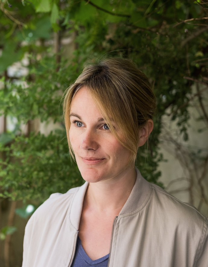 Photo of a woman gazing into the middle distance. She is Catherine Bedford.