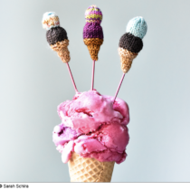Little knit ice cream cones sticking out of a bright pink real ice cream cone. © Sarah Schira
