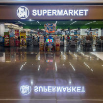 Supermarket entrance. No people.