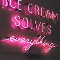 Ice cream solves everything in neon by Brendan Church