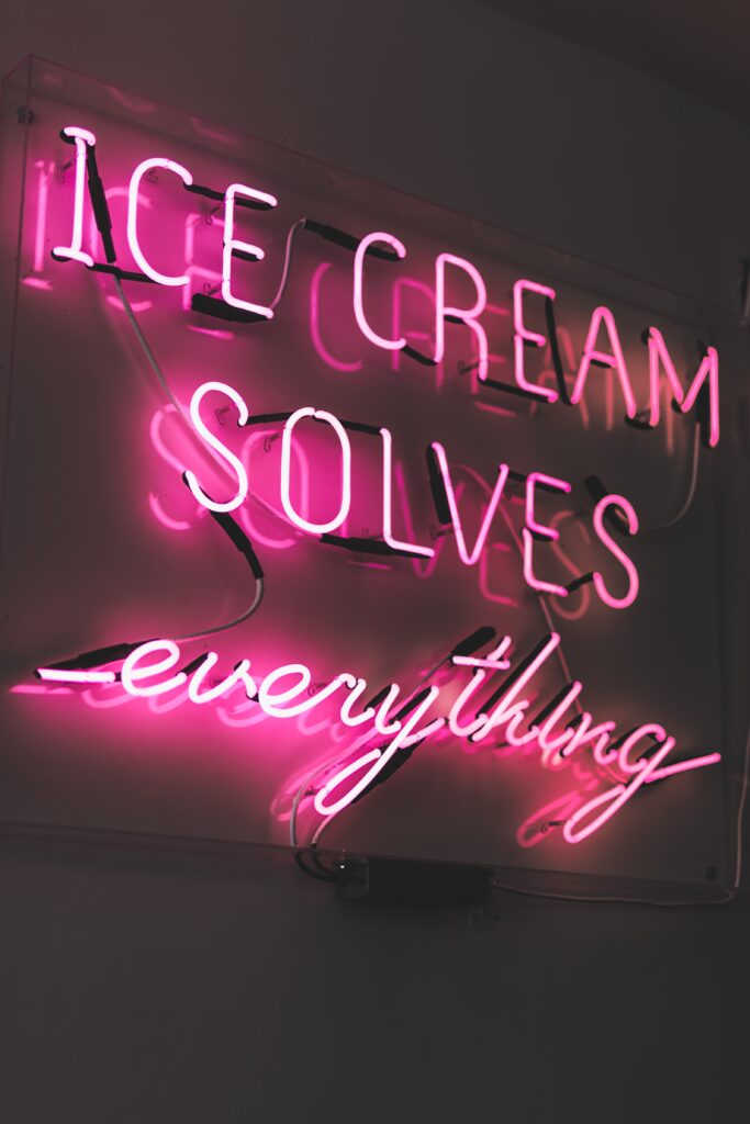Ice cream solves everything in neon by Brendan Church